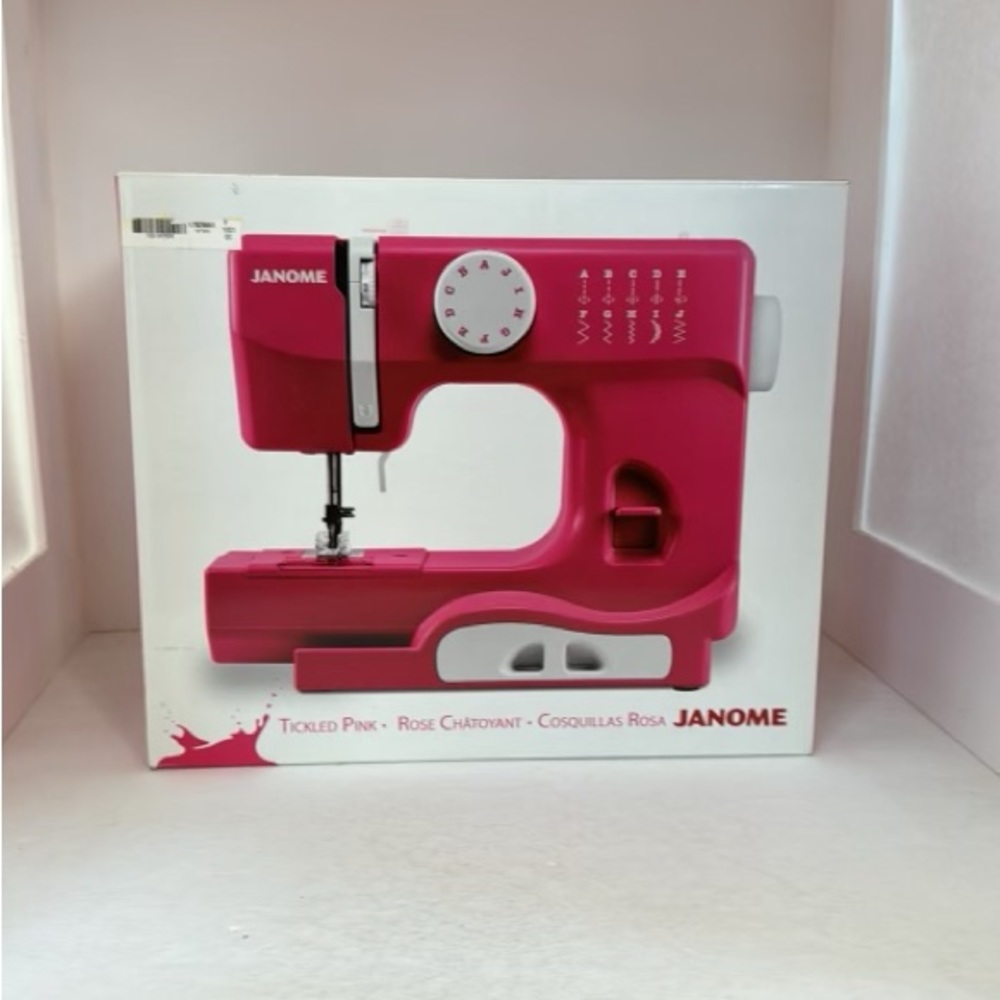 Pink JANOME sewing machine.